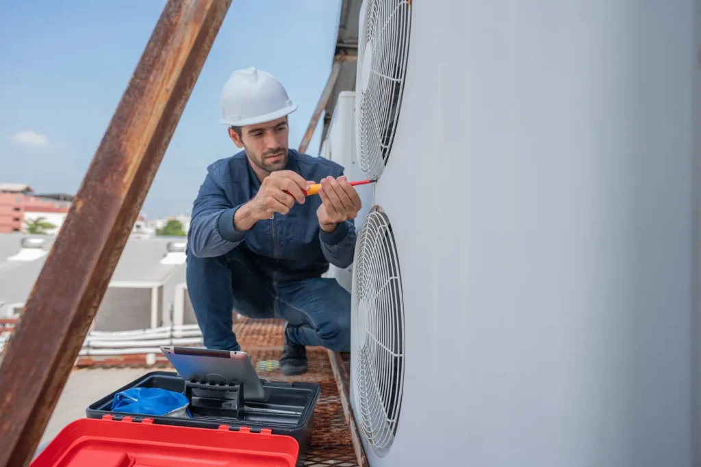 Technician performing AC Replacement